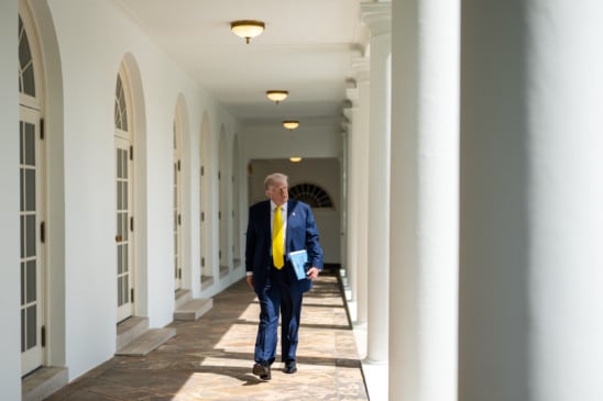 President Donald Trump walks on the West Colonnade to the Oval Office, Monday, July 21, 2025. (Official White House Photo by Molly Riley)