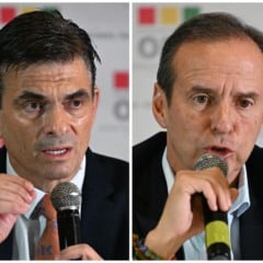 (COMBO) This combination of file pictures created on October 14, 2025, shows Bolivia's presidential candidate for the Christian Democratic Party (PDC), Rodrigo Paz (L), speaking during a press conference before the last presidential debate at the Real Plaza Hotel in La Paz on October 12, 2025, and Bolivia's presidential candidate for the Freedom and Democracy (Libre) Alliance, Jorge "Tuto" Quiroga, speaking during a press conference before the last presidential debate at the Real Plaza Hotel in La Paz on October 12, 2025. An ex-president and a senator will go head-to-head in Bolivia's presidential runoff on October 19, 2025, both with promises to fix the South American country's broken economy. Senator Rodrigo Paz came from behind to take the top spot with 32 percent of votes cast in a first round in August, but has since fallen behind ex-president Jorge "Tuto" Quiroga in stated voter intention. (Photo by Aizar RALDES / AFP)